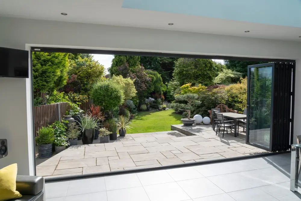 luxury home extensions wide open exit to garden