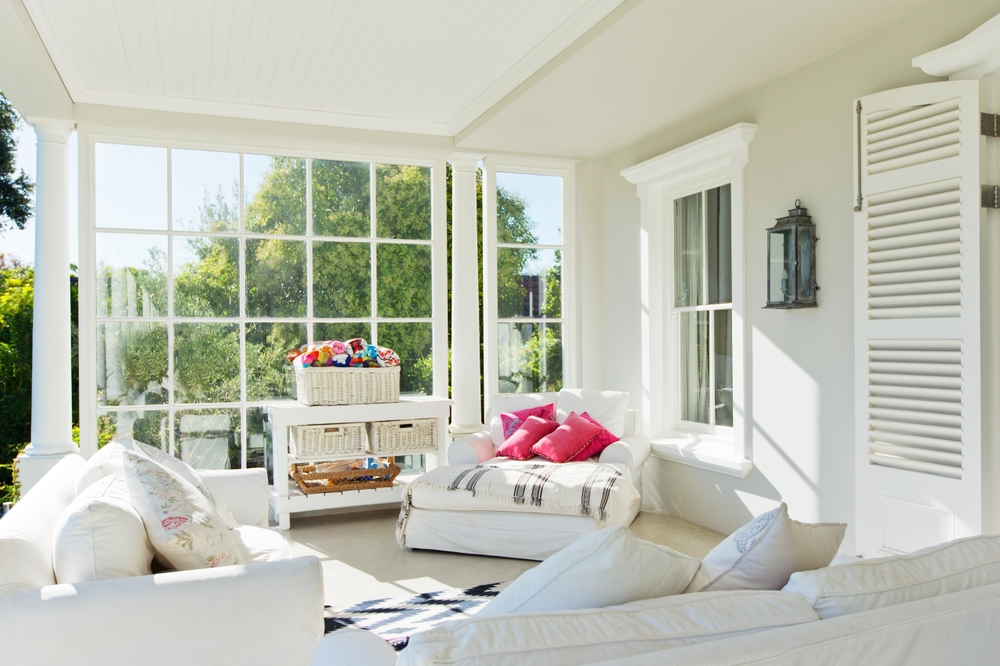 sun room cosy living space garden view